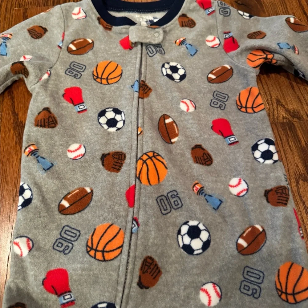 Pair of Carter's fleece PJs with zipper and footies.  Size 24 Months